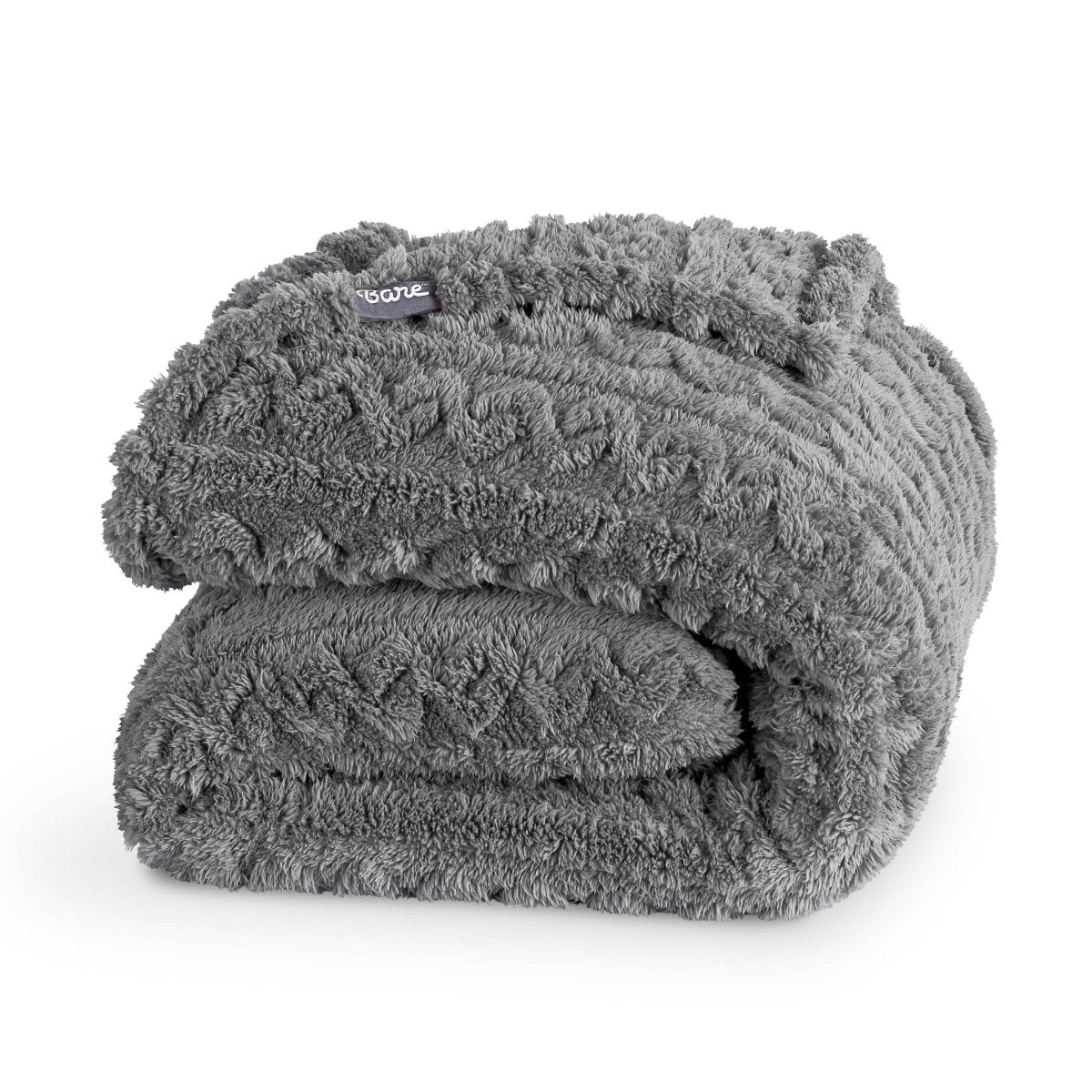 Cable knit faux shearling blanket folded