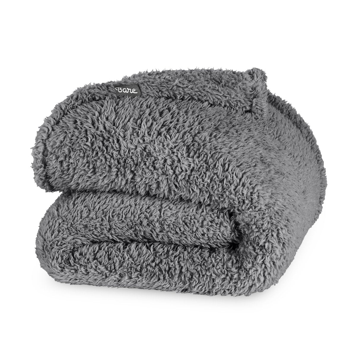Folded textured blanket with a brand label on a white background