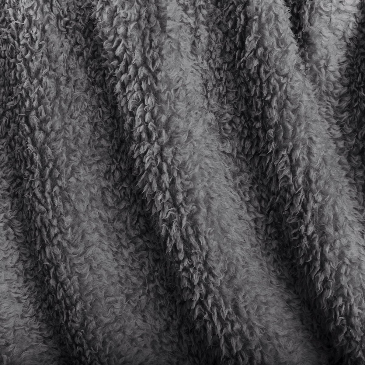 Close-up of textured faux shearling blanket