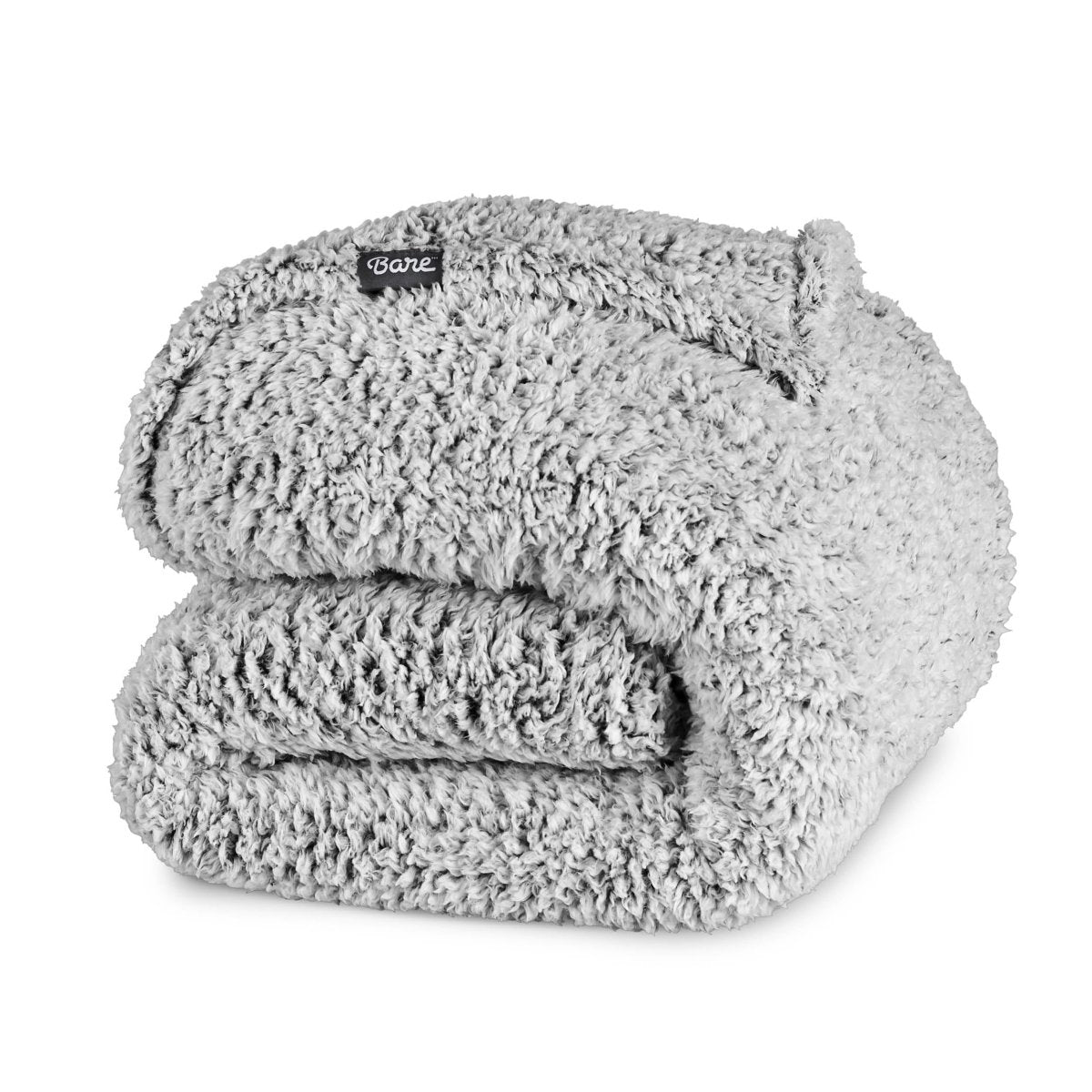 Tipped faux shearling blanket folded
