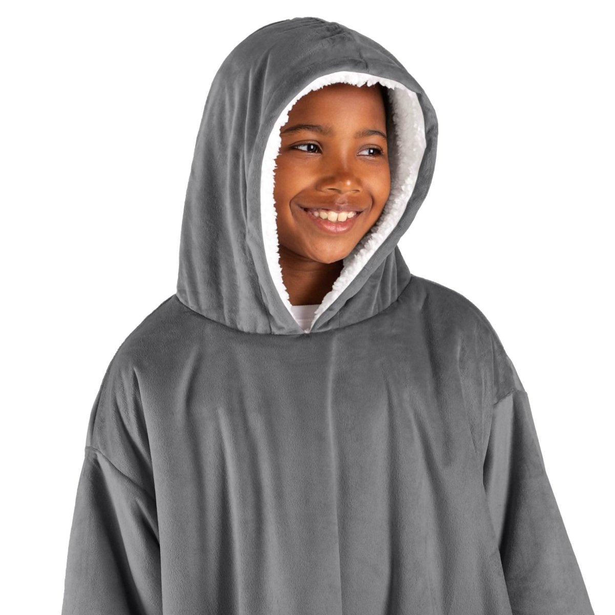 A child with a wearable blanket on
