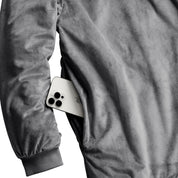 Close up of one side pocket on the sherpa wearable blanket