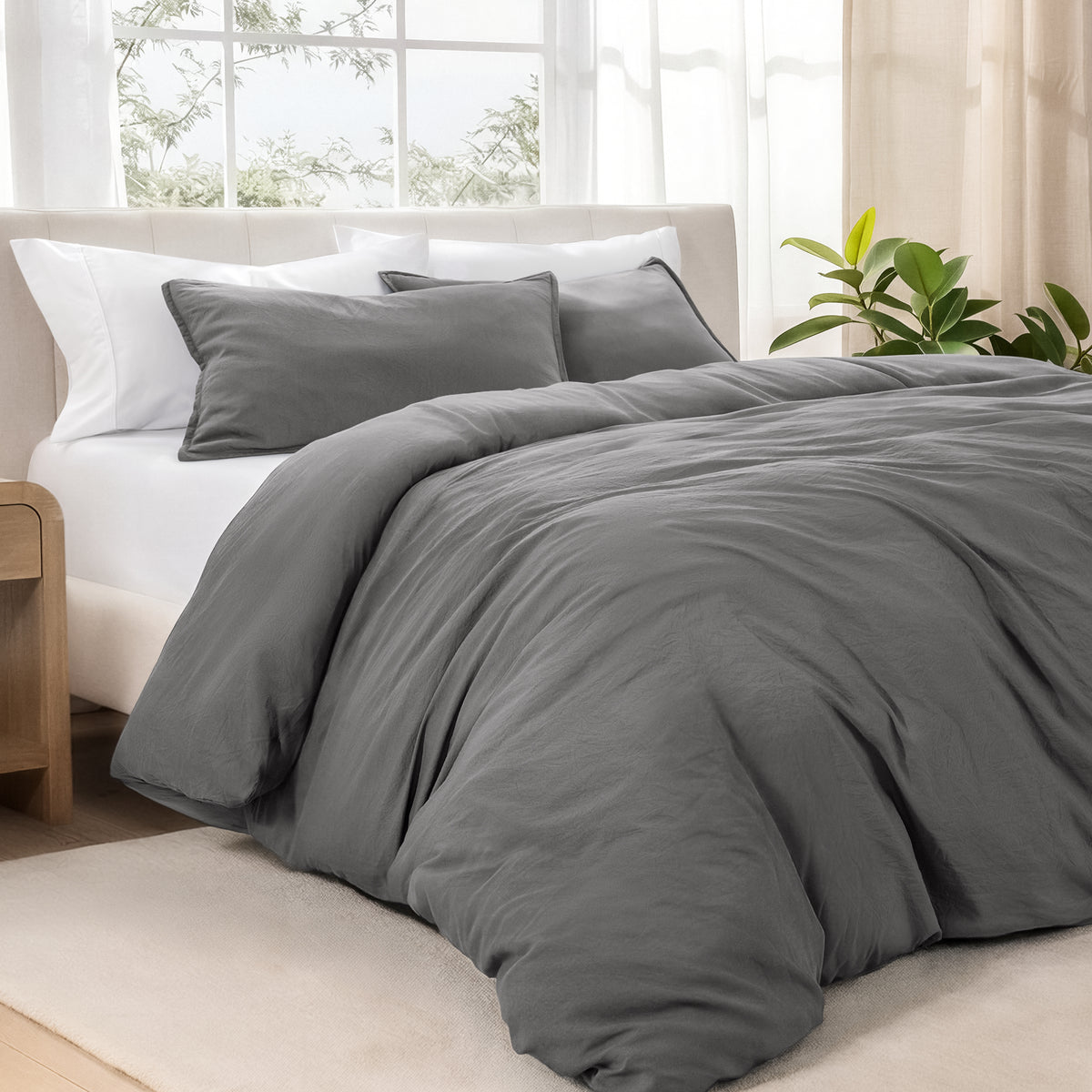 Bedding set on a bed in a bright room with natural light
