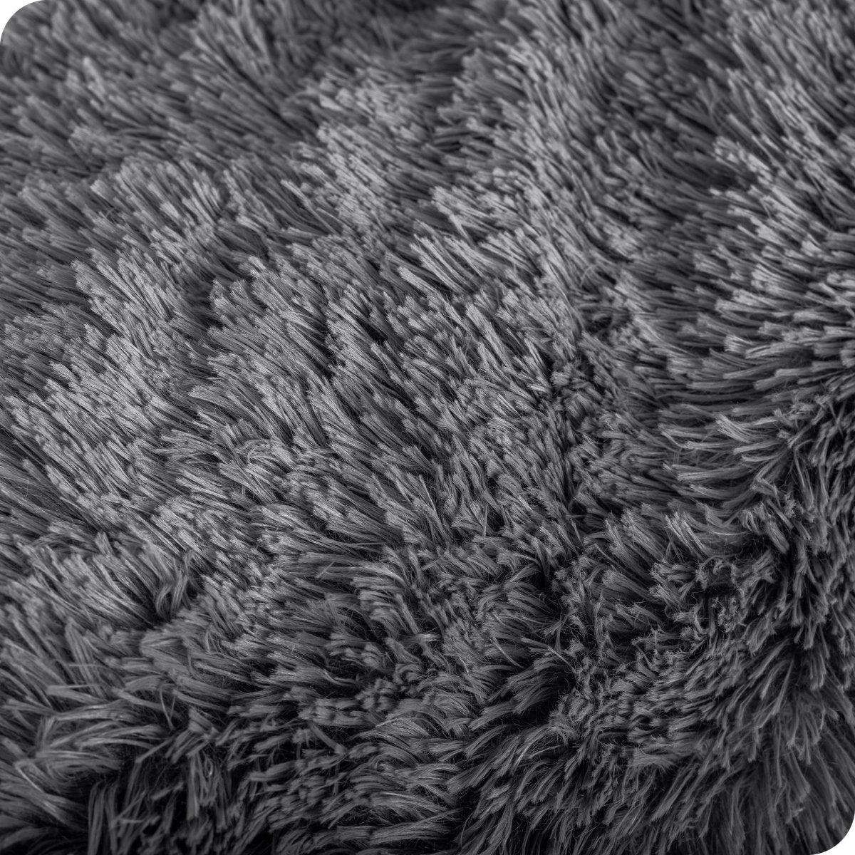 Close up of the soft texture of a shaggy faux fur sherpa blanket