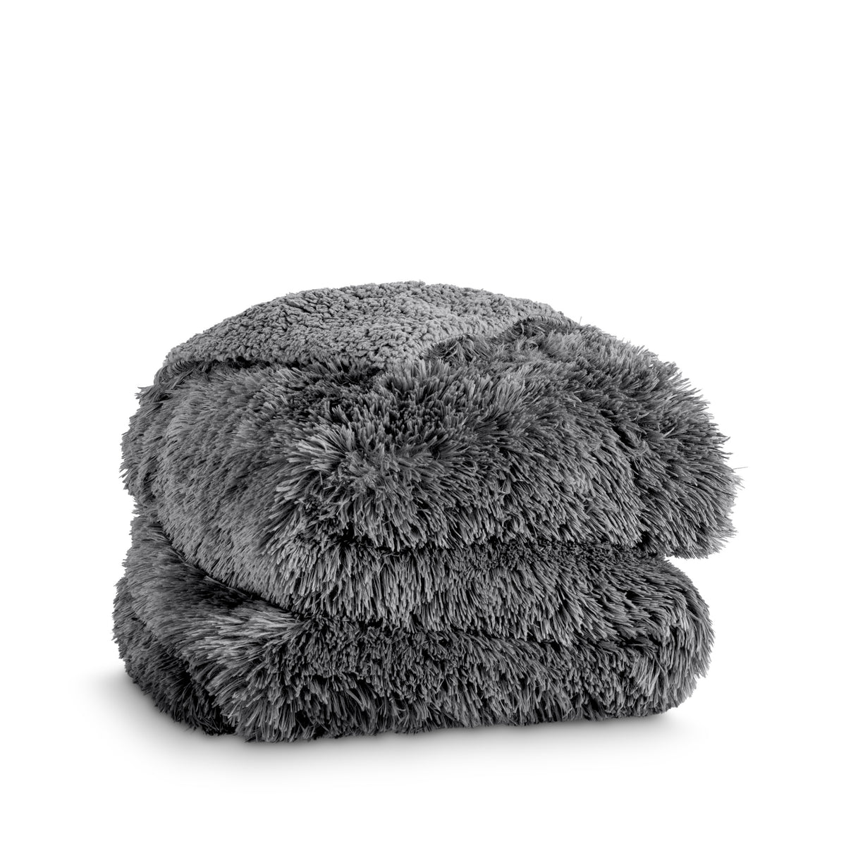 A shaggy faux fur blanket folded