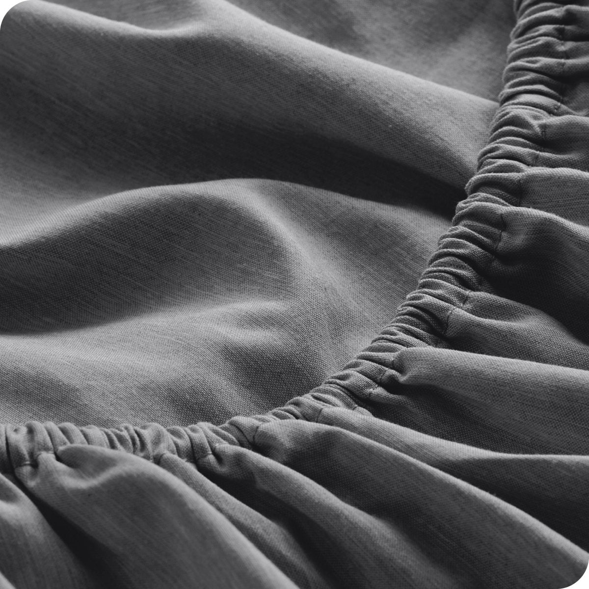Close-up of fitted sheet with elastic edge