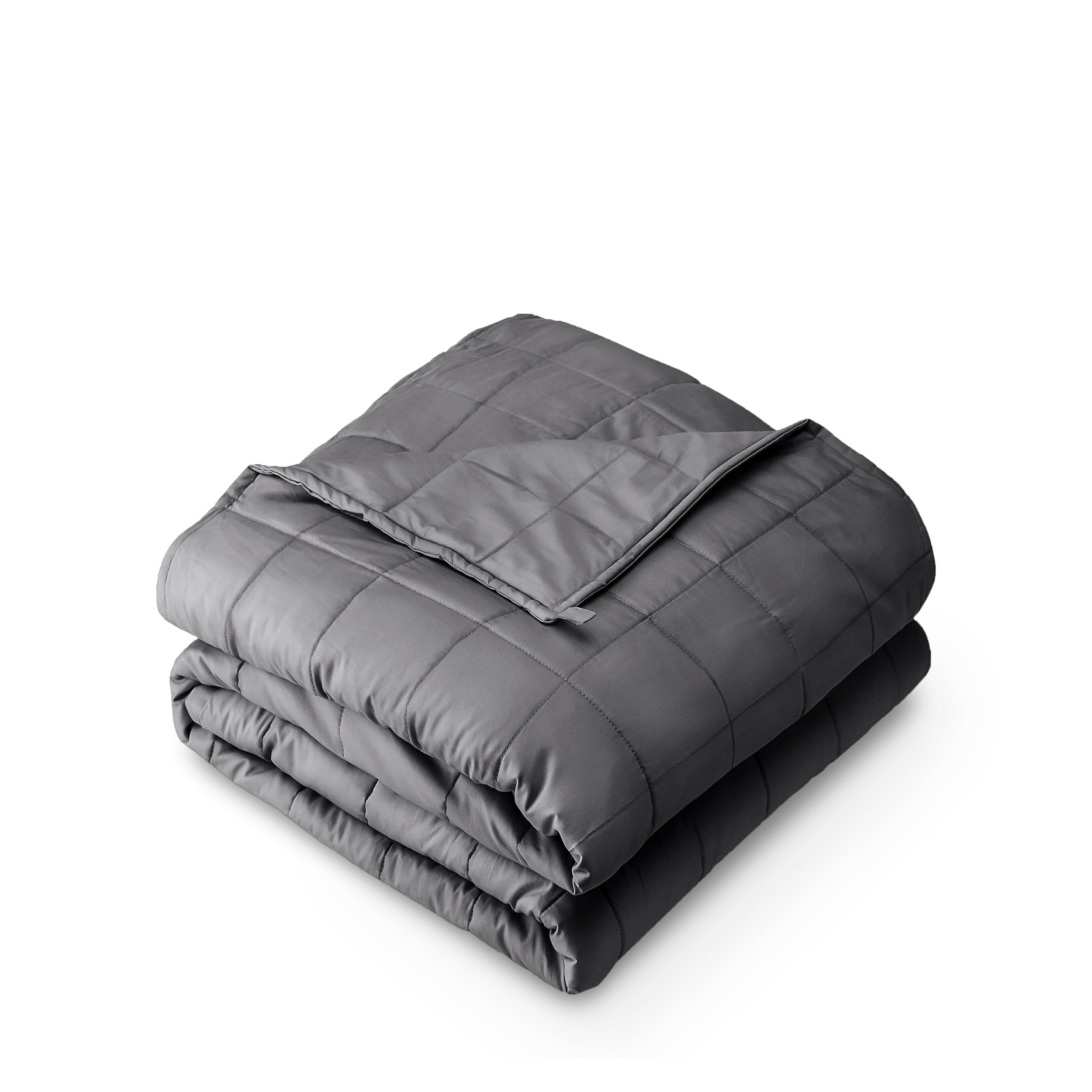 A folded cotton weighted blanket with a white background