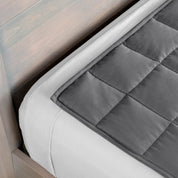 Close-up of a weighted blanket on a bed