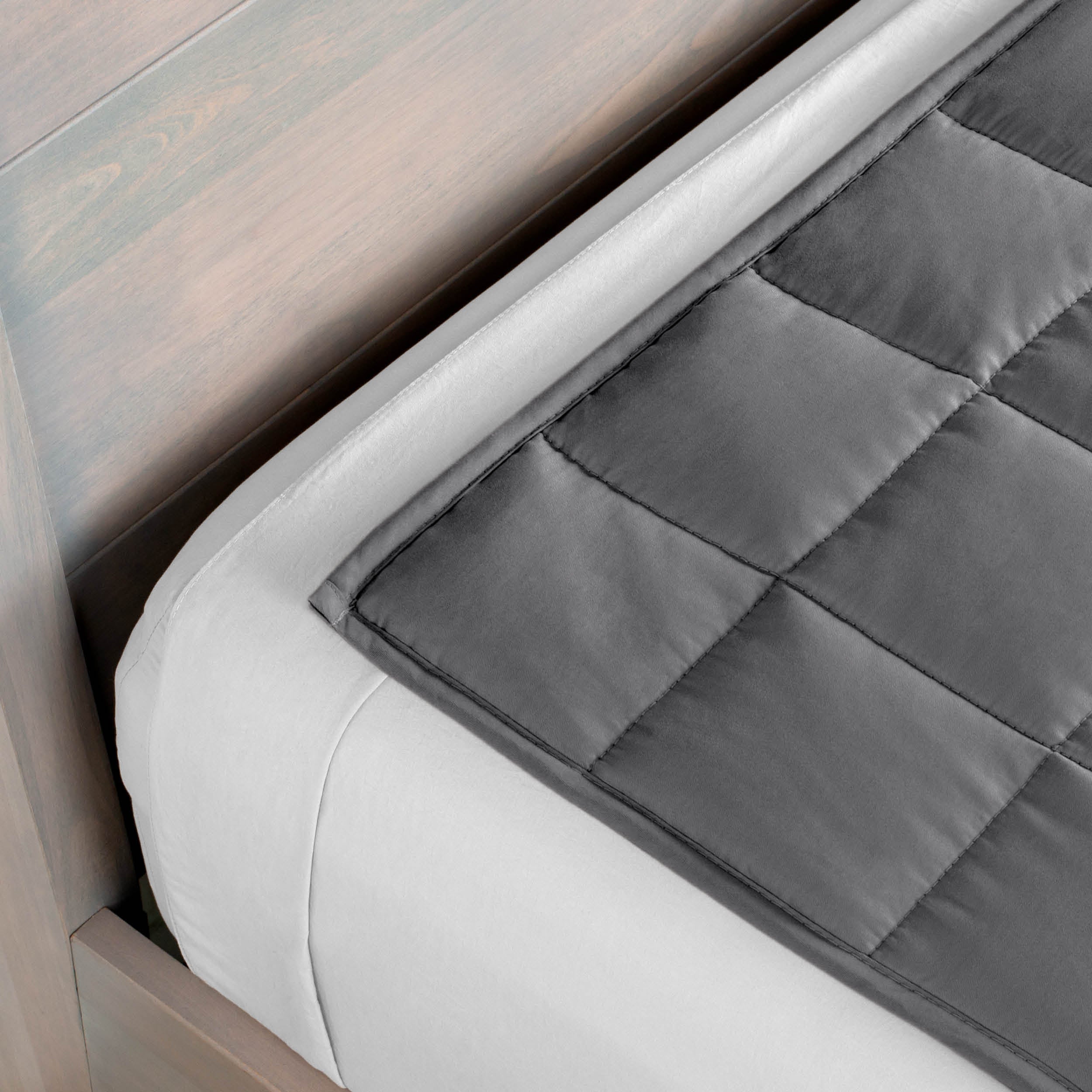 Close-up of a weighted blanket on a bed