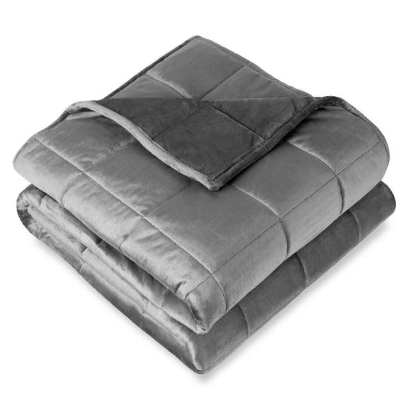 A folded minky weighted blanket with a white background