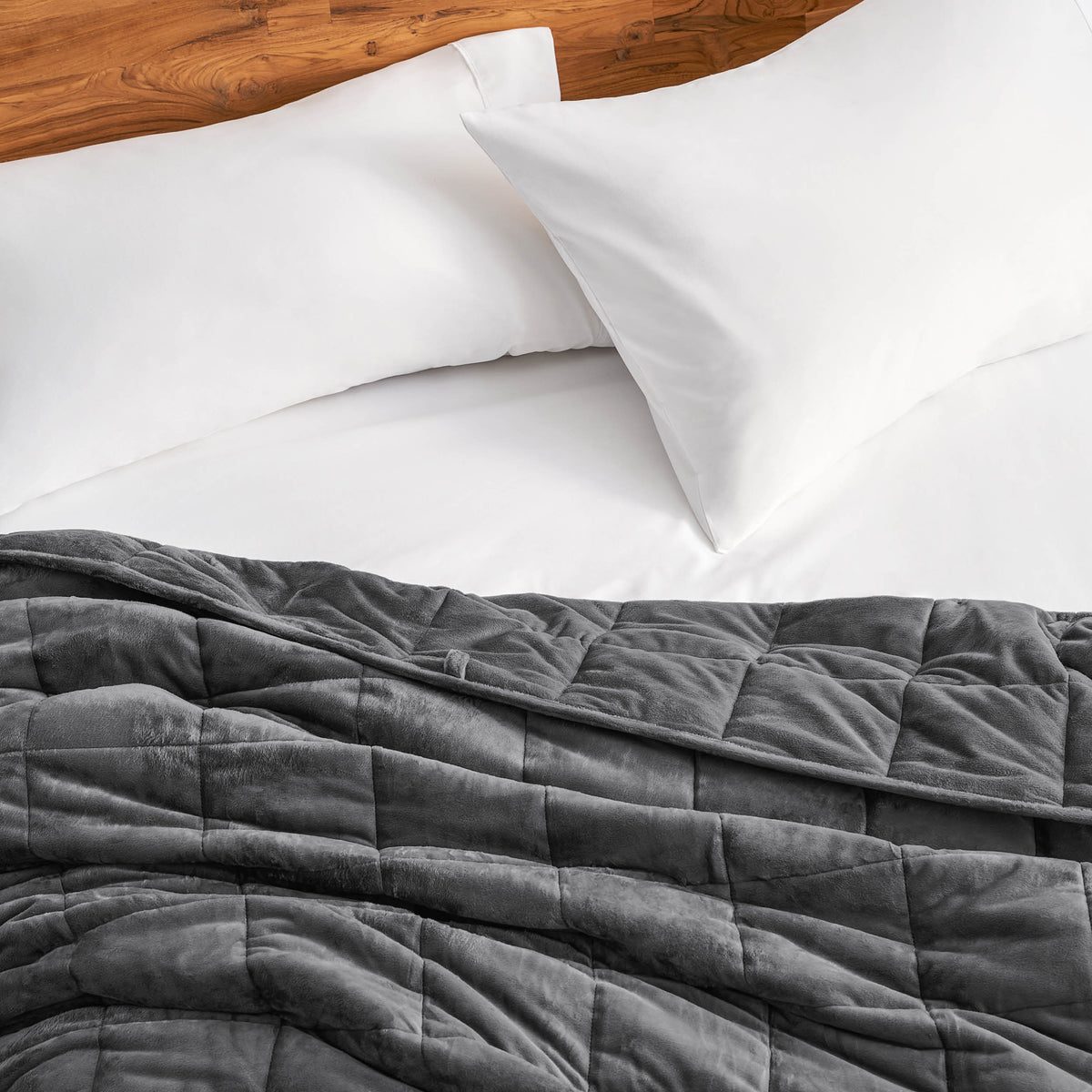 Close-up of a minky weighted blanket on a bed