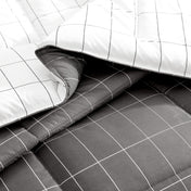 Gray checkered comforter close up