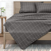 Printed flat sheet on a bed