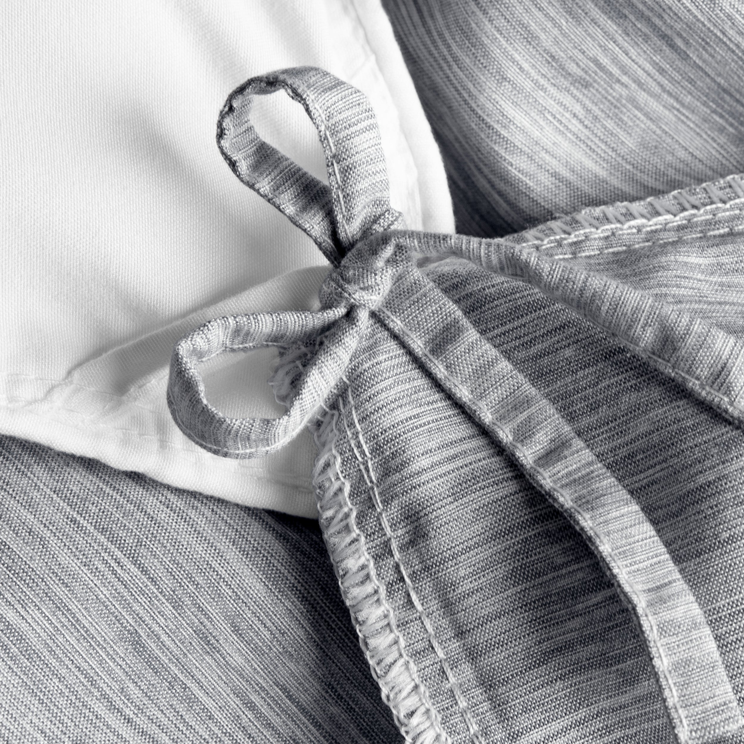 Close-up of a a corner tie detail on a duvet cover