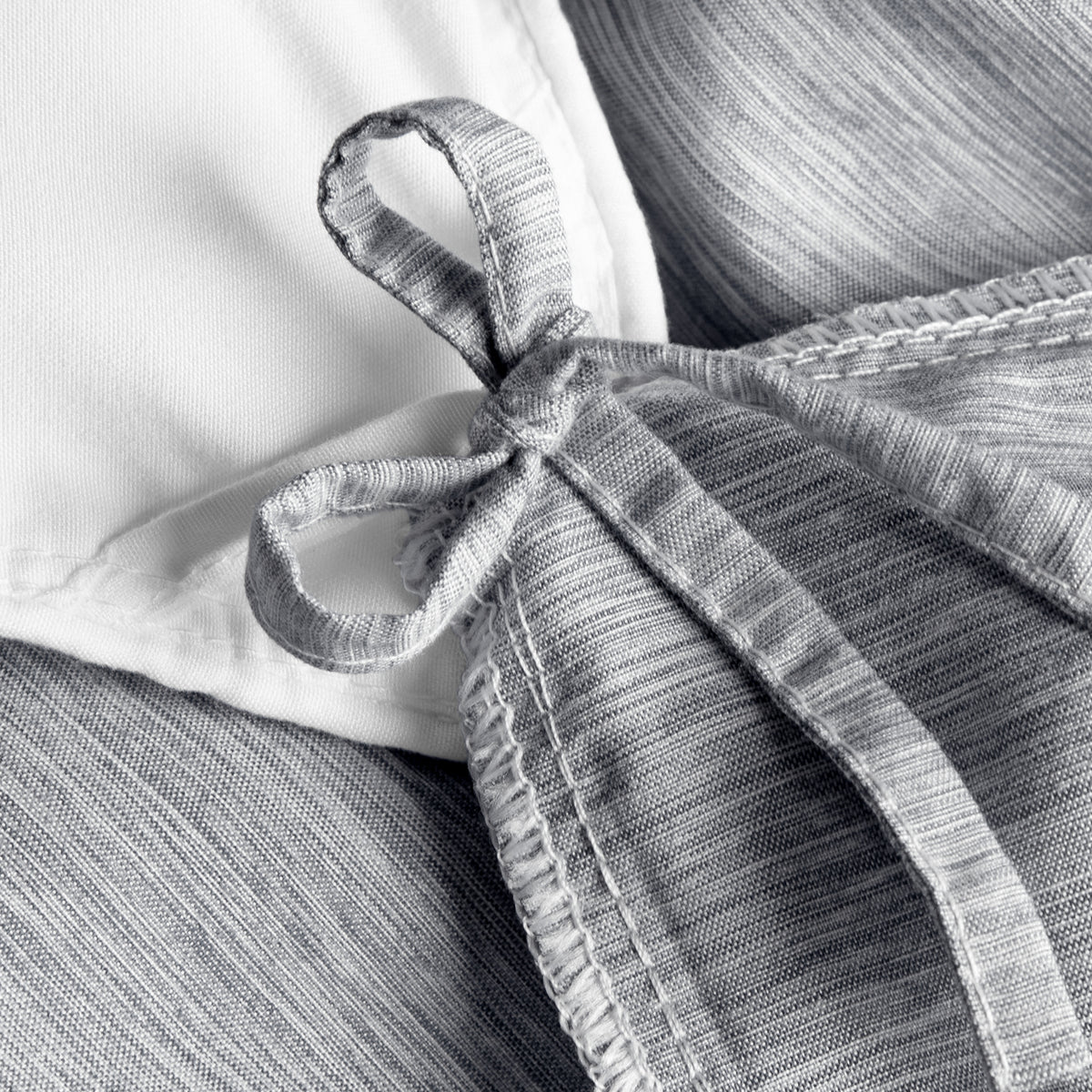 Close-up of a a corner tie detail on a duvet cover