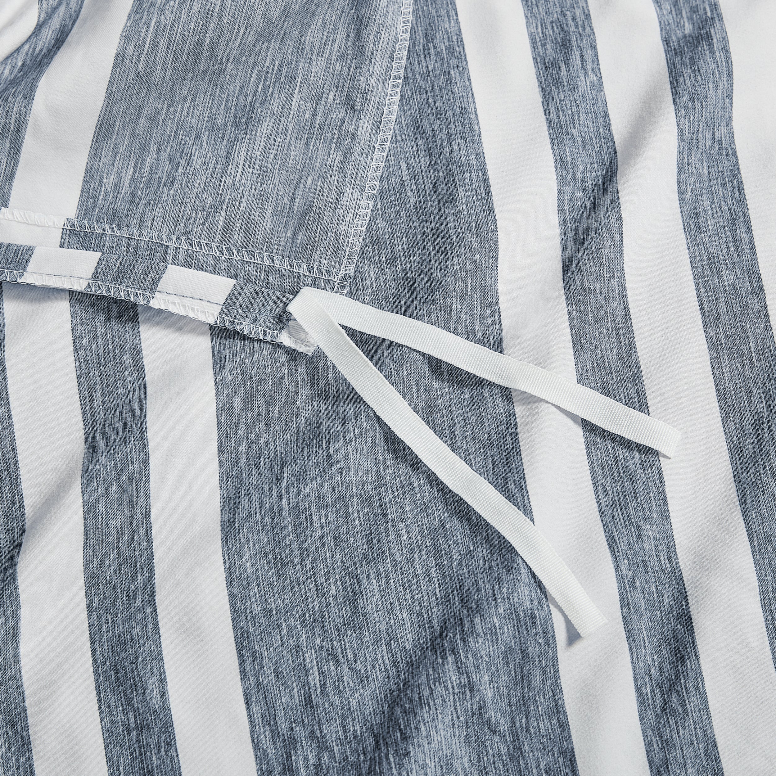 Close-up of a a corner tie detail on a duvet cover