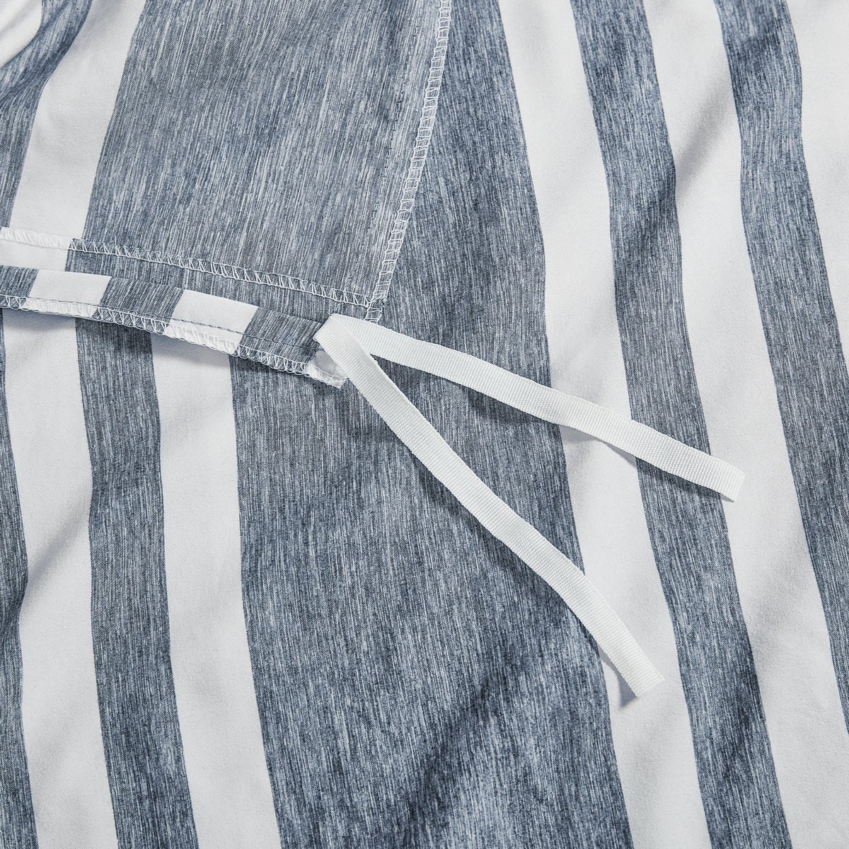 Close-up of a a corner tie detail on a duvet cover