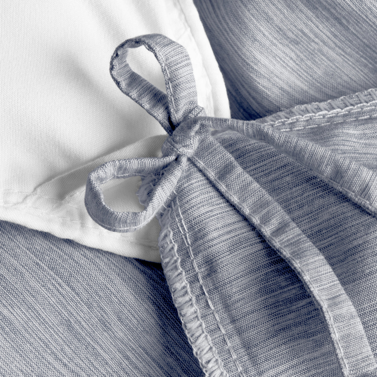 Close-up of a a corner tie detail on a duvet cover