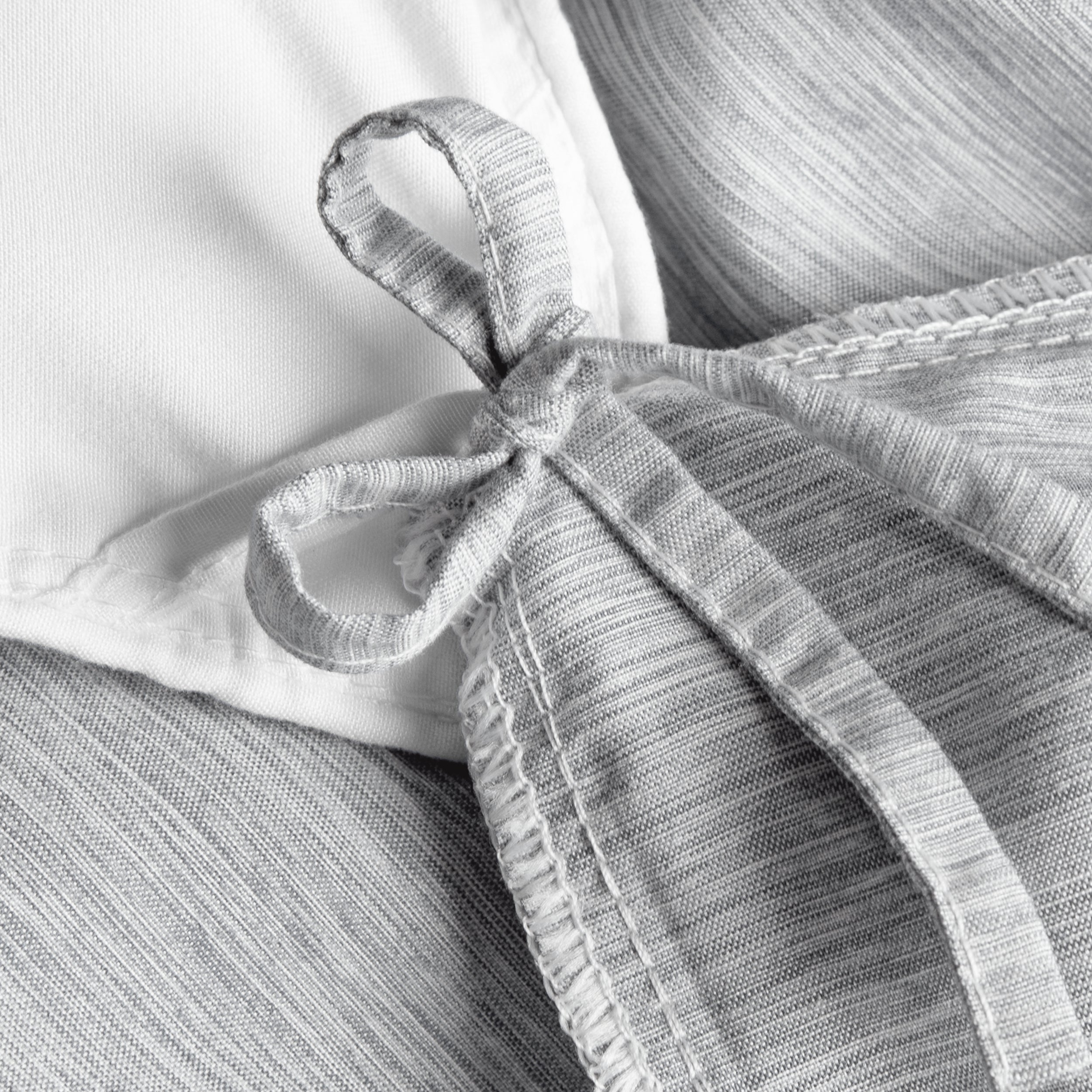 Close-up of a a corner tie detail on a duvet cover