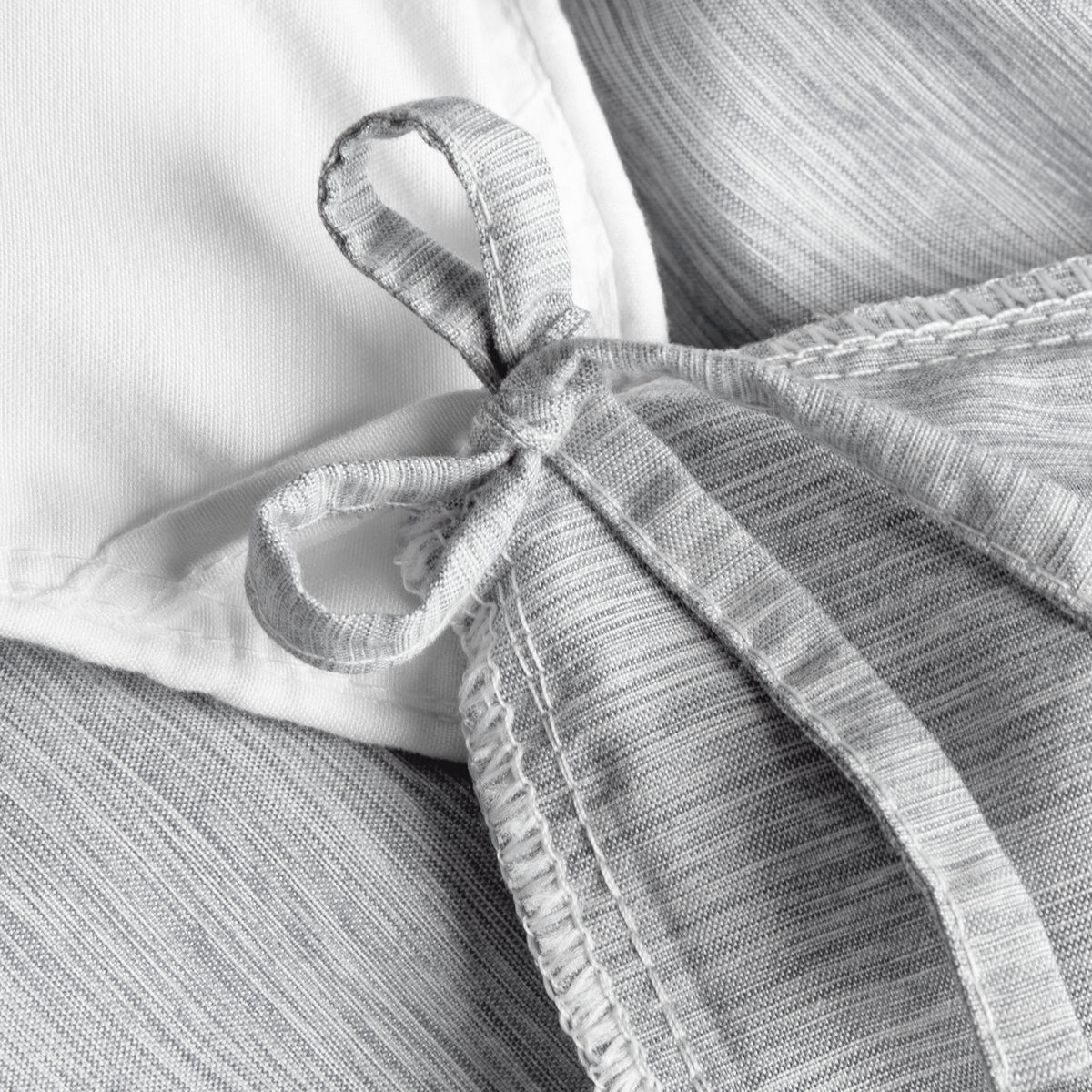 Close-up of a a corner tie detail on a duvet cover