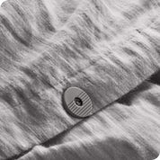 A button on the flannel duvet cover