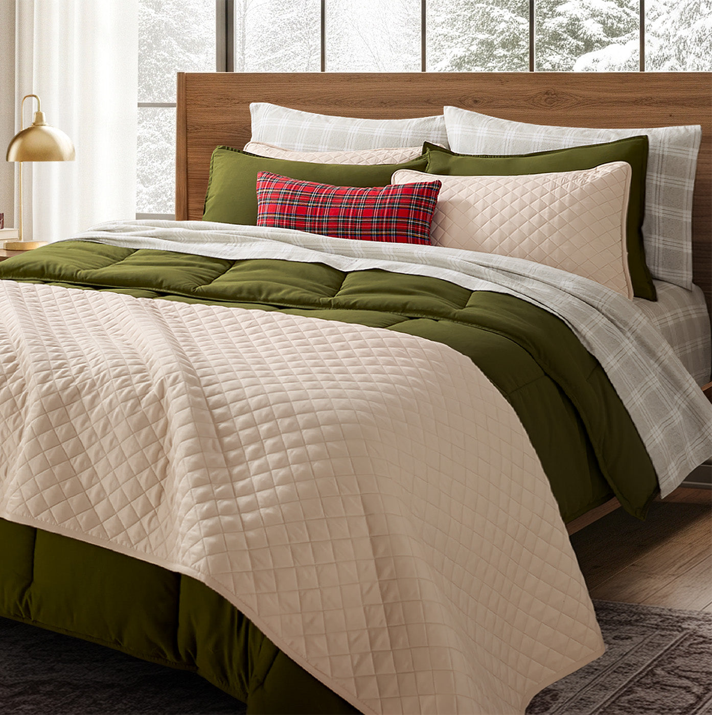Holiday inspired bedding layered on a wood bed frame in a upscale traditional home.