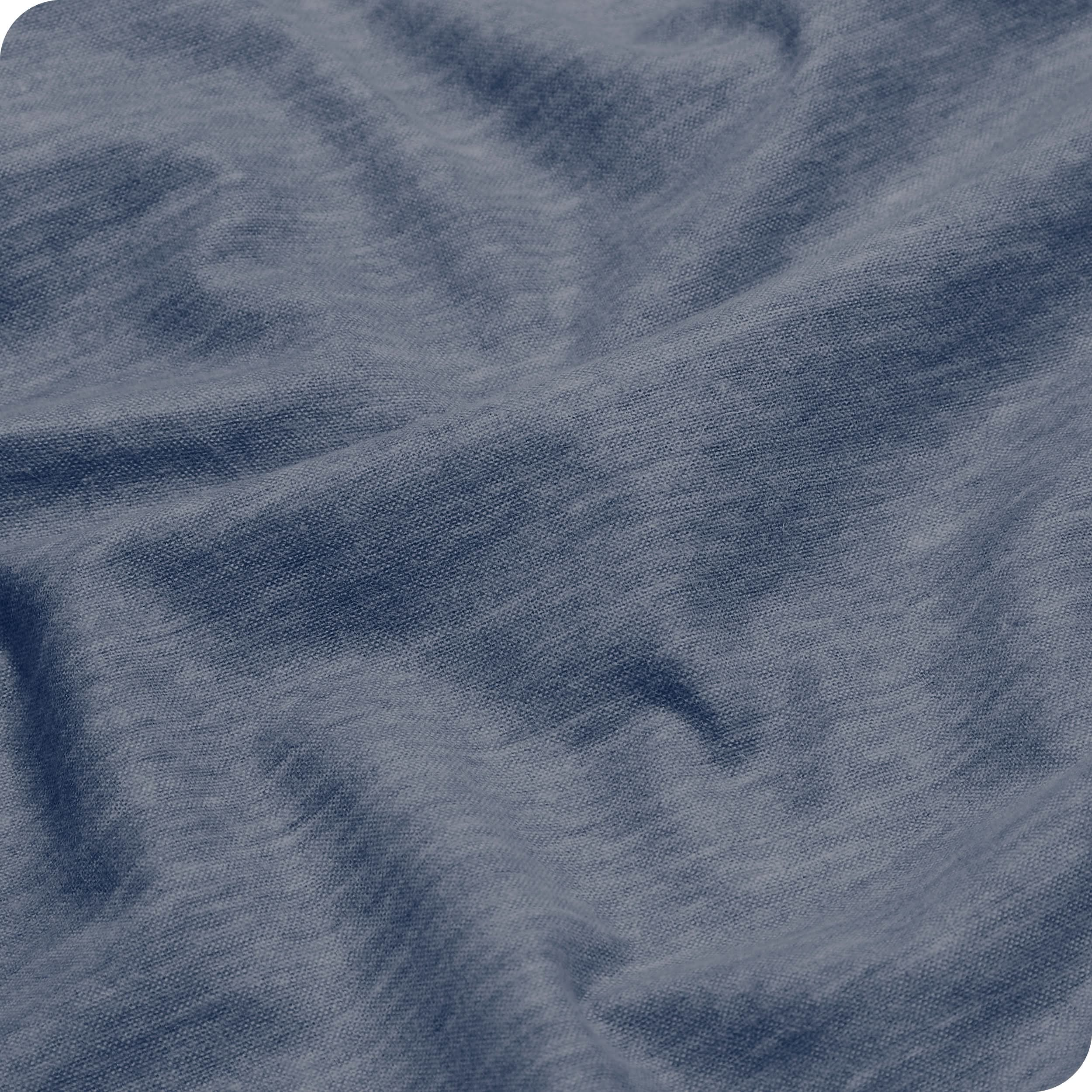 A close up view of a flannel sheet showing the texture.