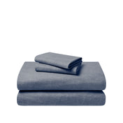 Set of flannel bed sheets on a white background