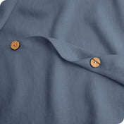 Close up of buttons used to secure duvet insert inside the cover