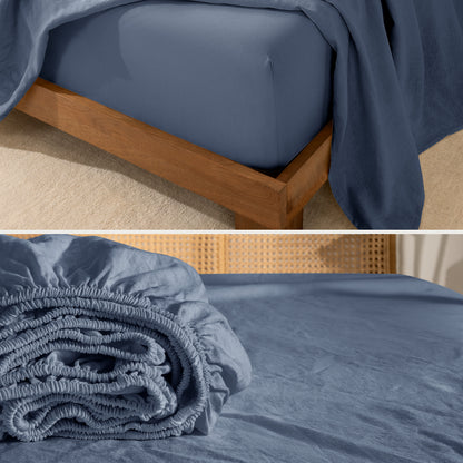 Fitted sheet on a wooden bed frame and folded fitted sheet.