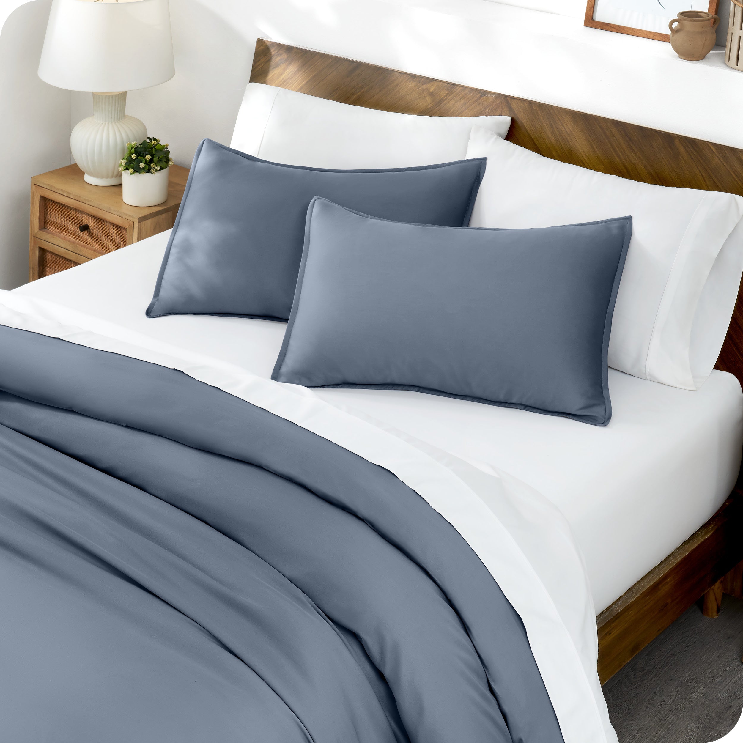 Matching TENCEL™ duvet cover and pillow shams on a bed