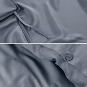 Close-up of duvet ties and button.
