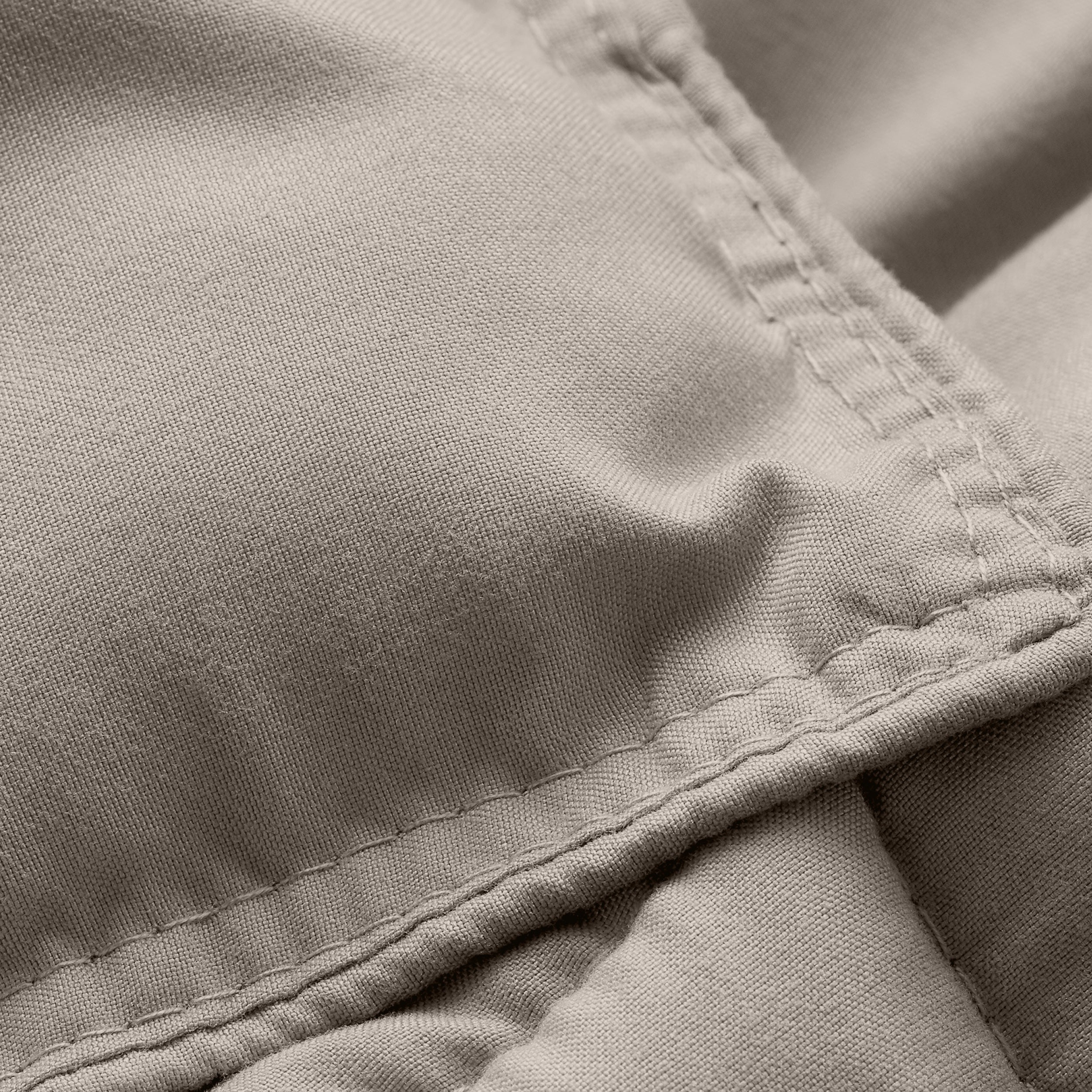 Close-up of comforter fabric with stitching detail