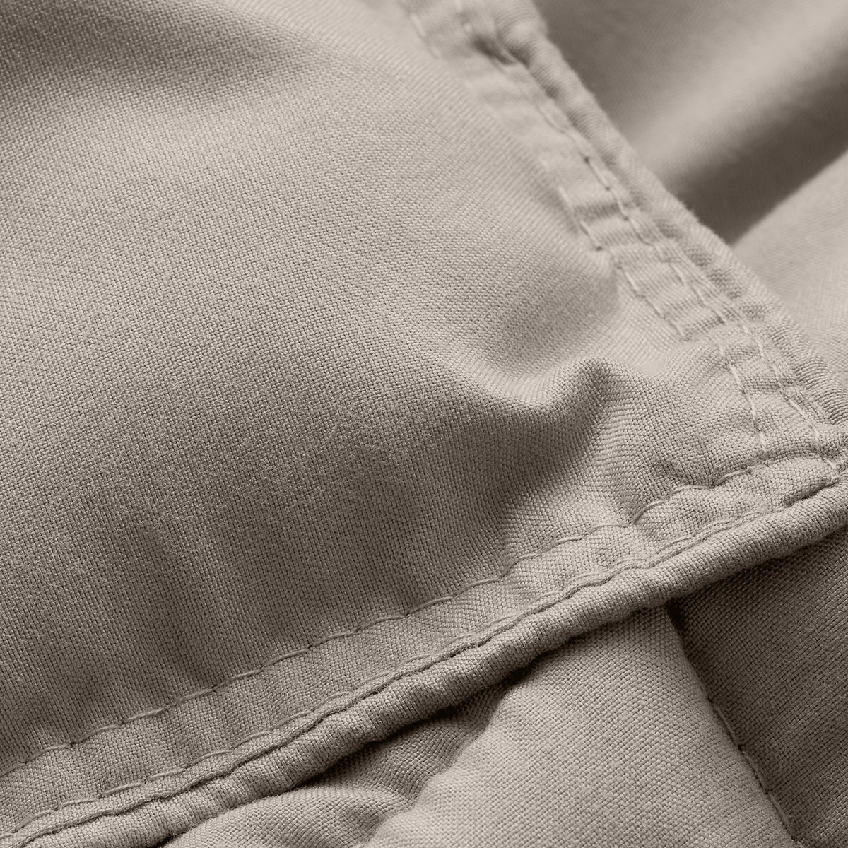Close-up of comforter fabric with stitching detail