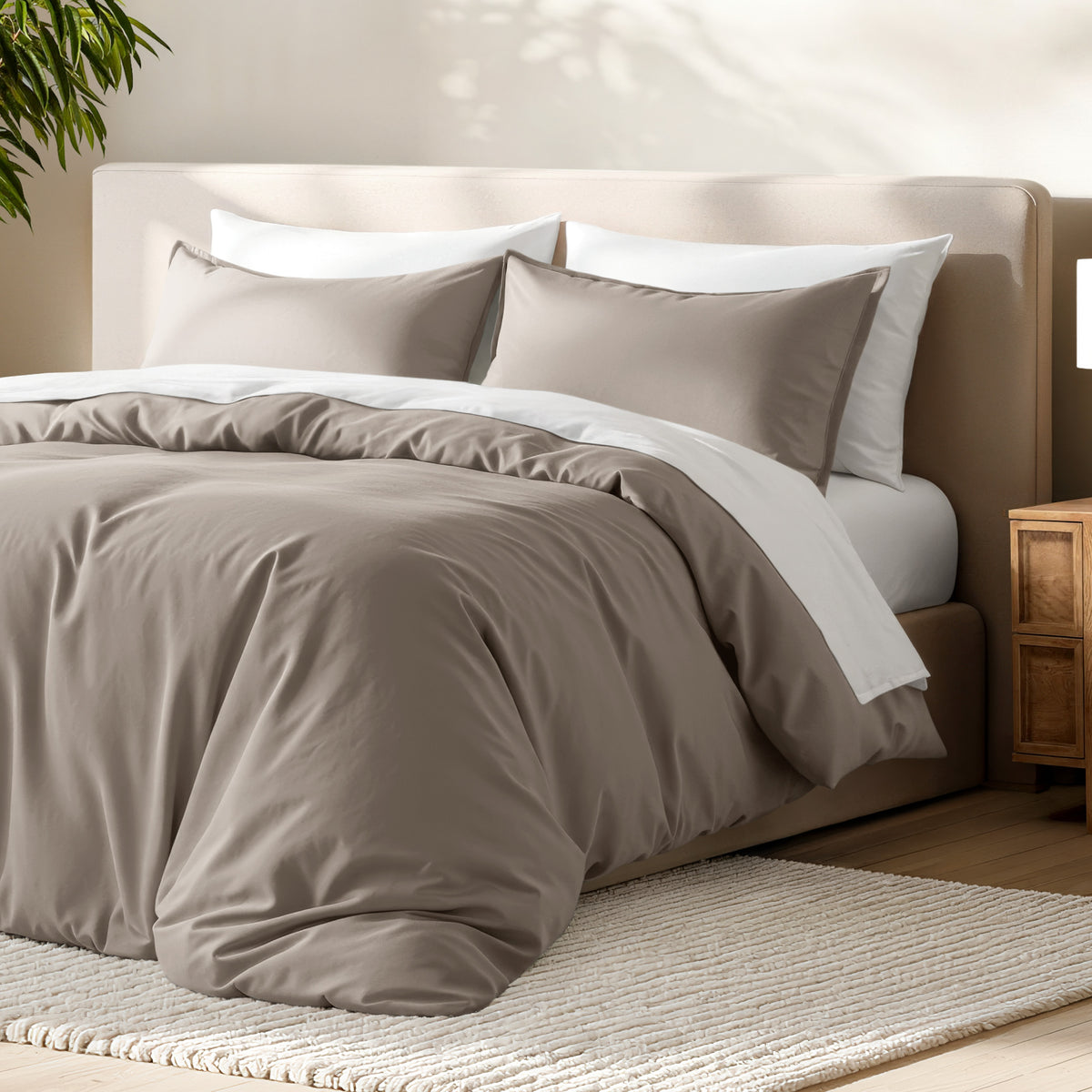 Bed with microfiber duvet cover and sham set in a bedroom setting.