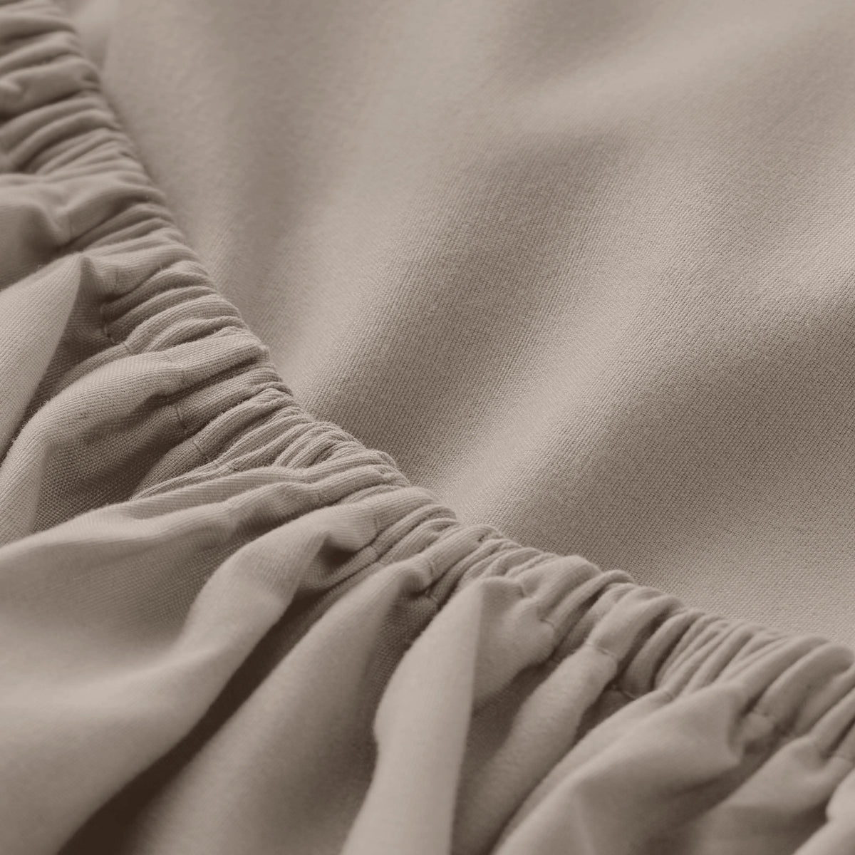 Close-up of fitted sheet with all around elastic