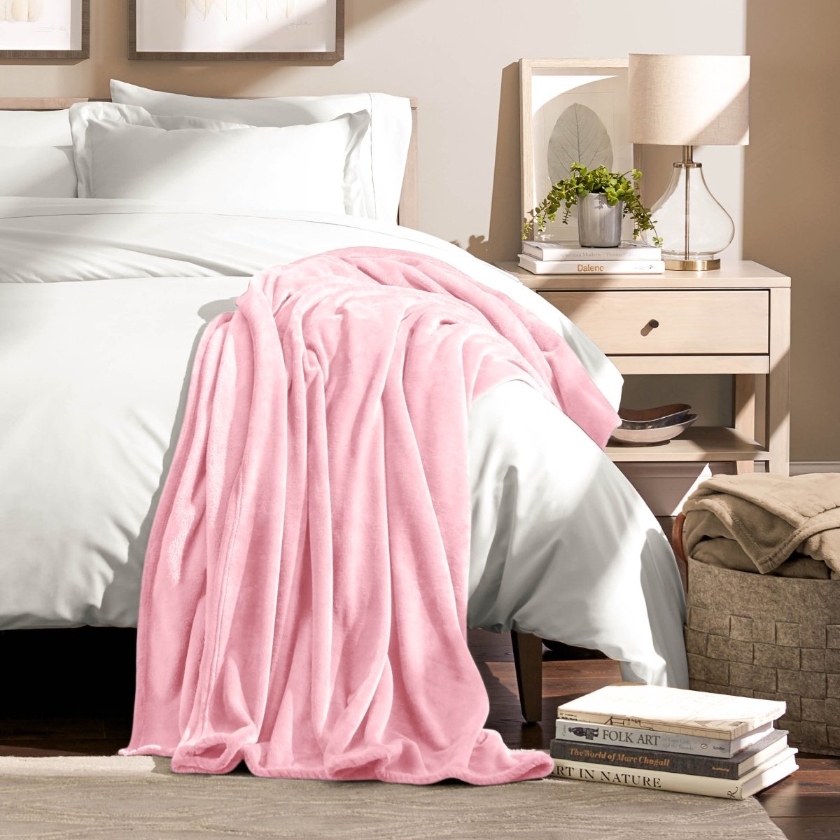 A microplush blanket draped over the corner of a bed