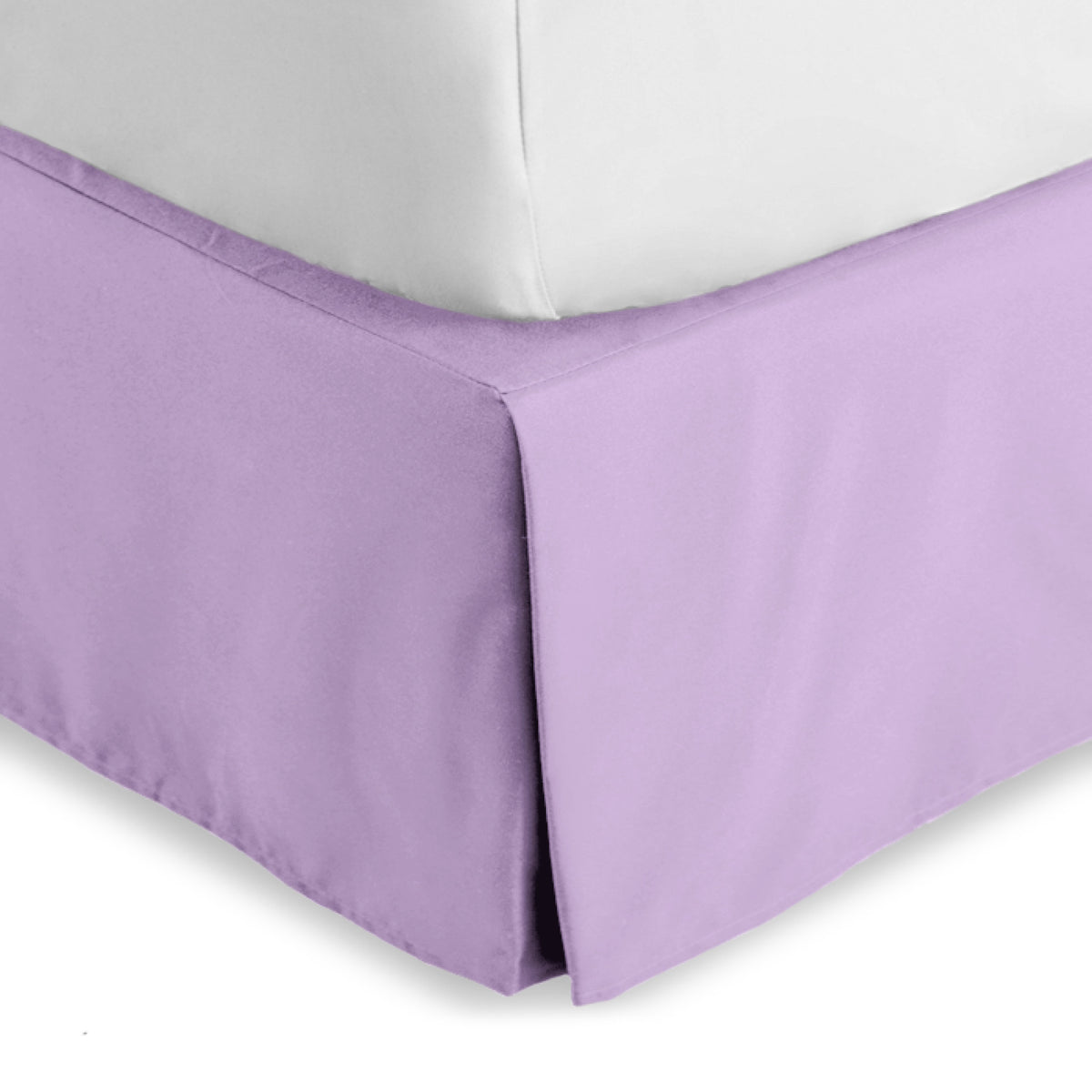 Bed skirt on a bed with white bedding