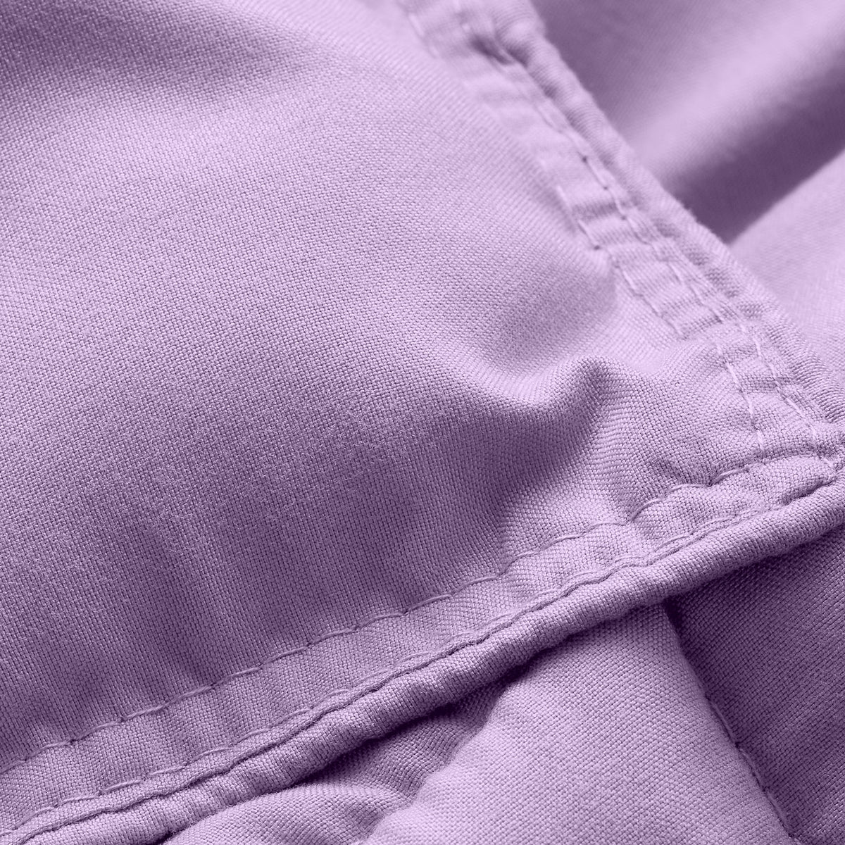 Close-up of comforter fabric with stitching detail