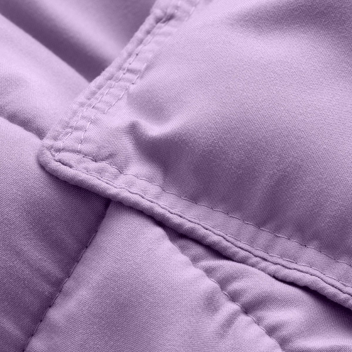 Close-up of comforter fabric with stitching detail