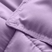 Close-up of comforter fabric with stitching detail