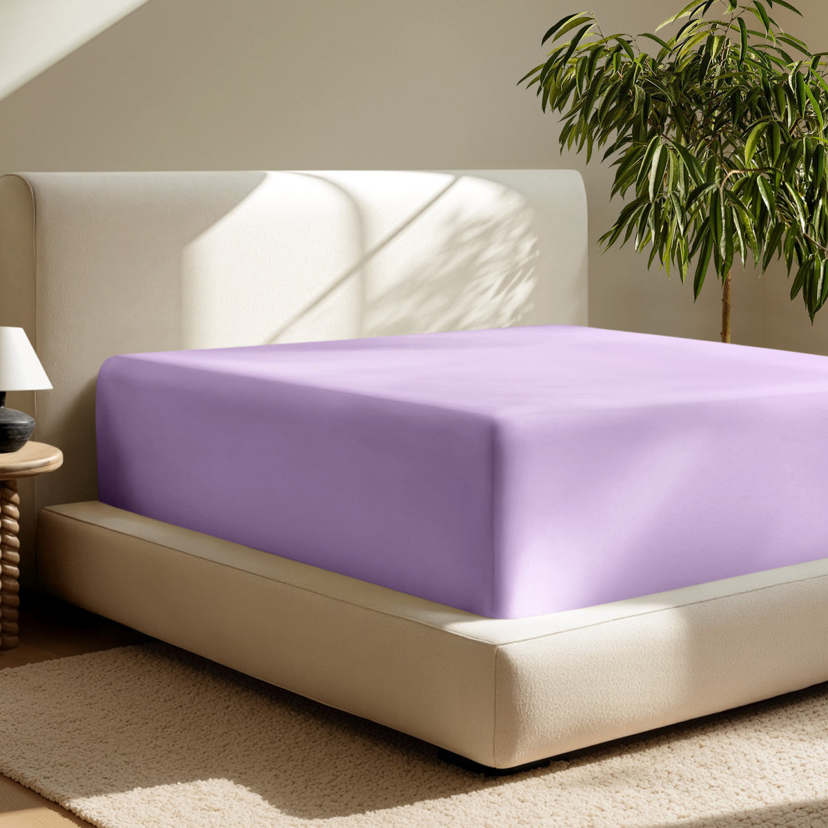 A deep pocket fitted sheet on a mattress