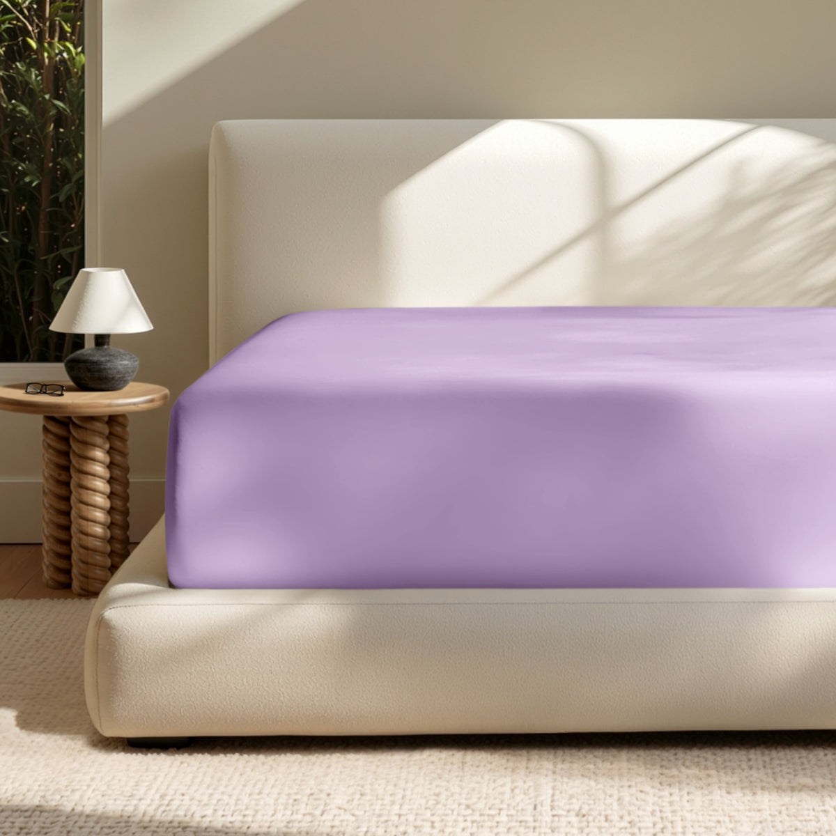 A deep pocket mattress with a fitted sheet on it