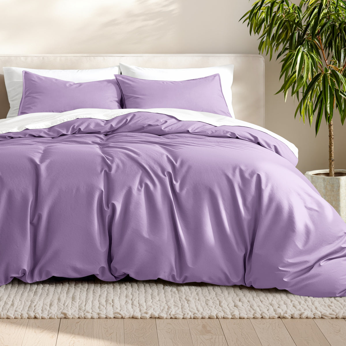 Microfiber bedding set on a bed with a neutral background