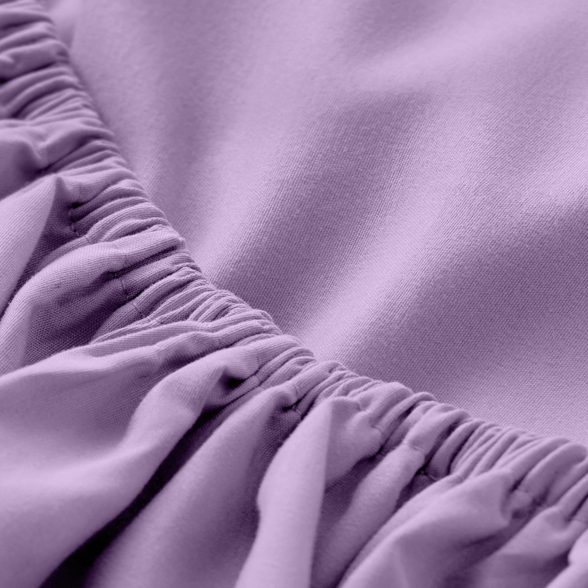 Close-up of fitted sheet with all around elastic