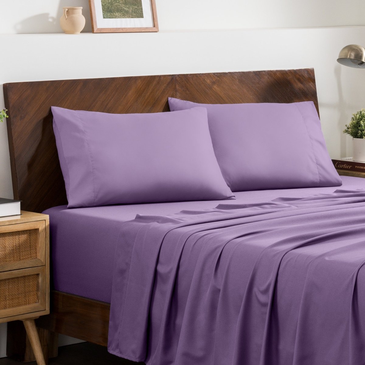 2 pillowcases on pillows on a nicely made bed