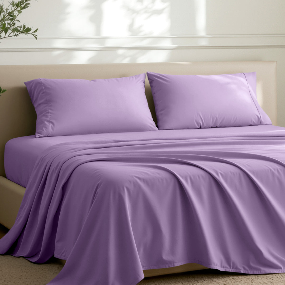 2 pillowcases on pillows on a nicely made bed