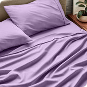 Close up of a microfiber sheet set on a bed