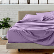 A modern bedroom with microfiber sheets on the mattress
