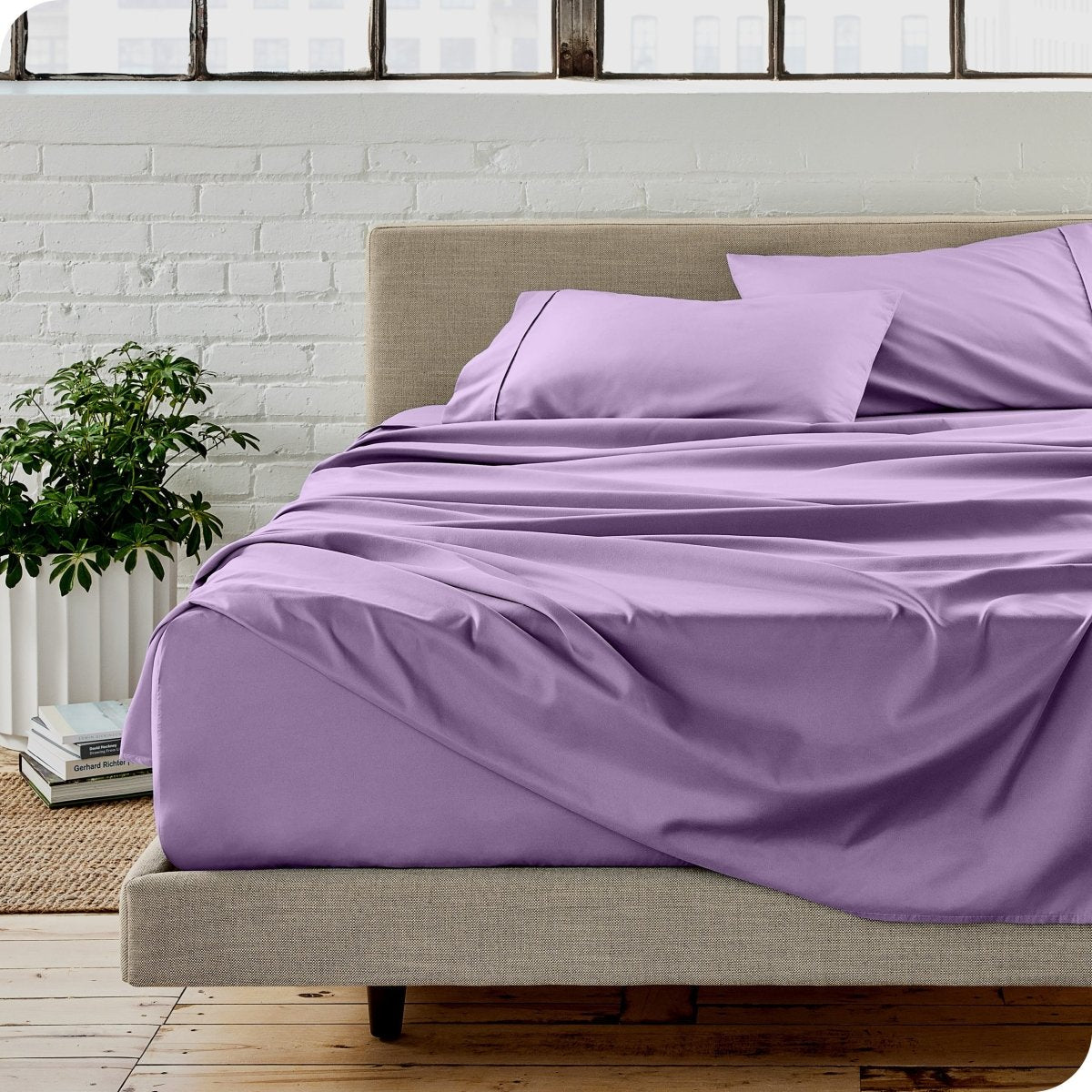 A modern bedroom with microfiber sheets on the mattress